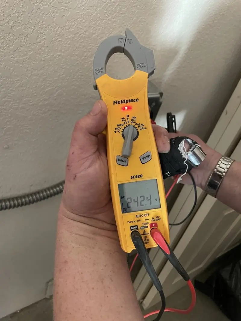 Voltage testing with clamp meter during Generator Installation in Vancouver